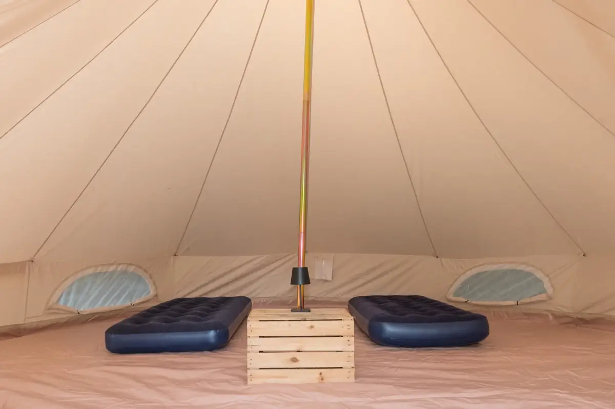 Essentials with an airbed swap, single beds laid out