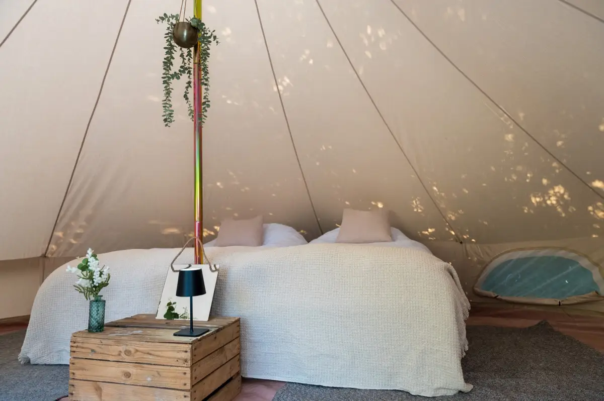 Two real beds pushed together as a king in a Luxury bell tent